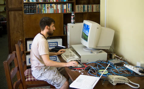 William works on the guest house computer