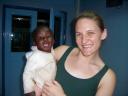 Jessica poses with the daughter of a worker at the hospital - Photo by Kathy Van Bibber