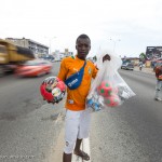 Street vendor in the road in Abidjan, Cote d'Ivoire